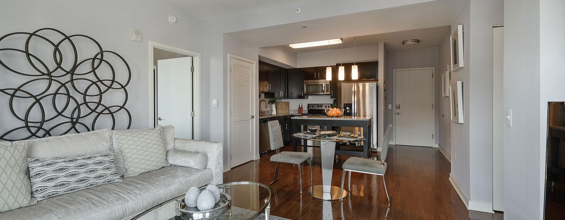 a living room with a couch and a table